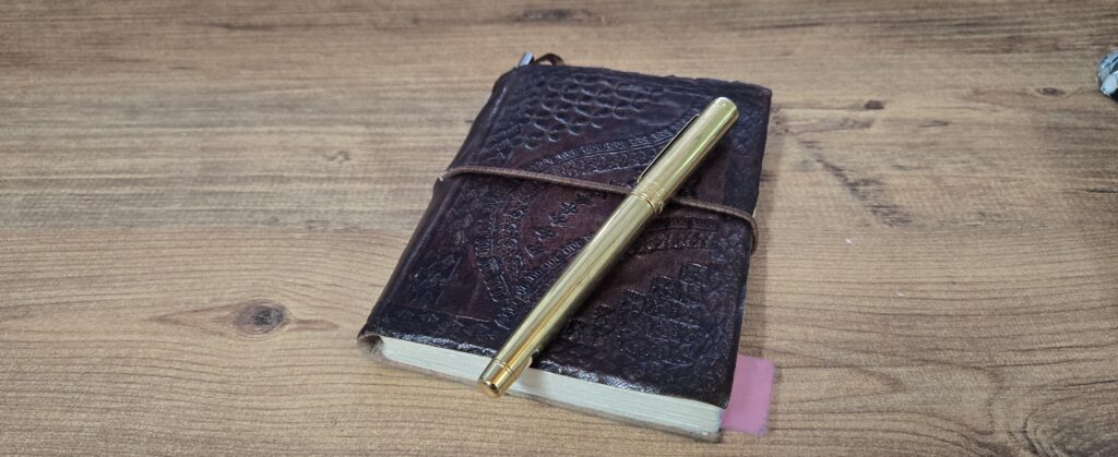 Picture of Journal & a pen